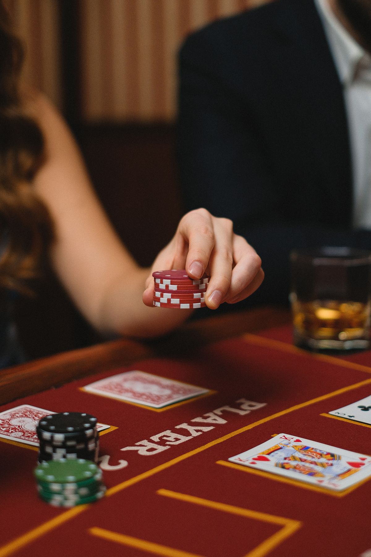woman with chips in casino