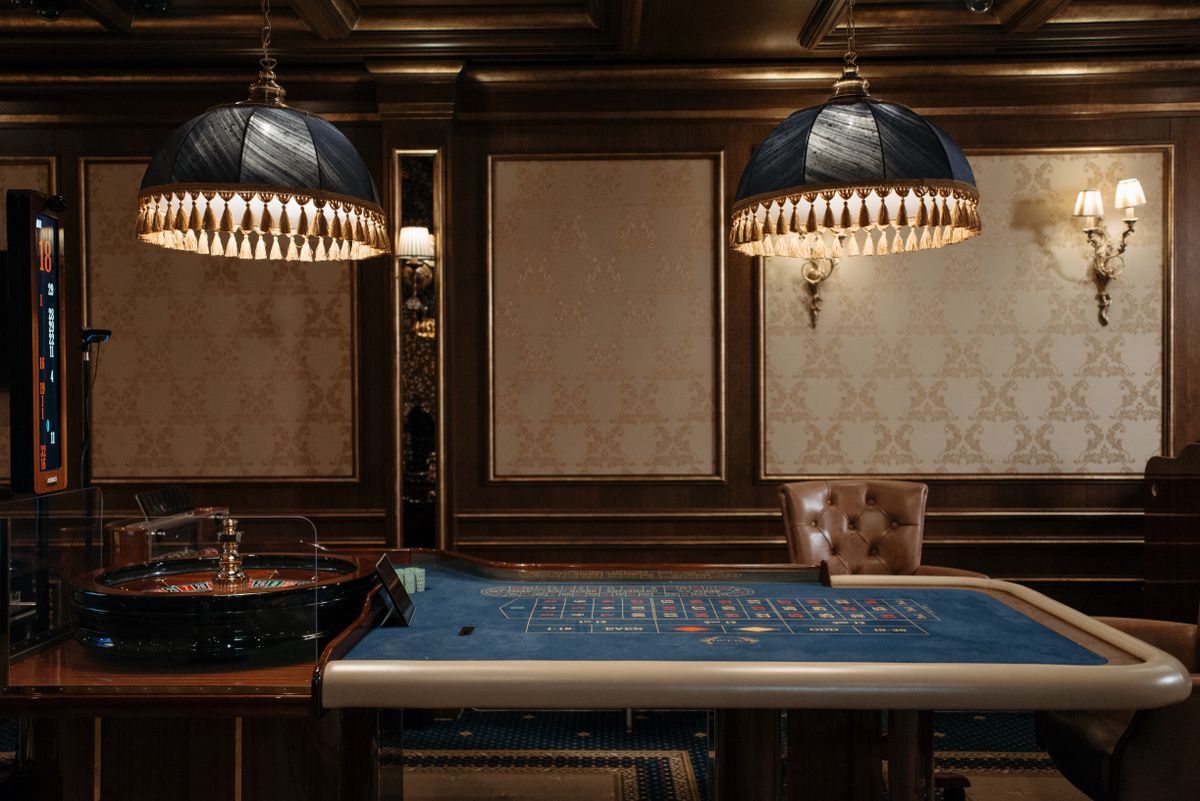 a roulette table inside a casino